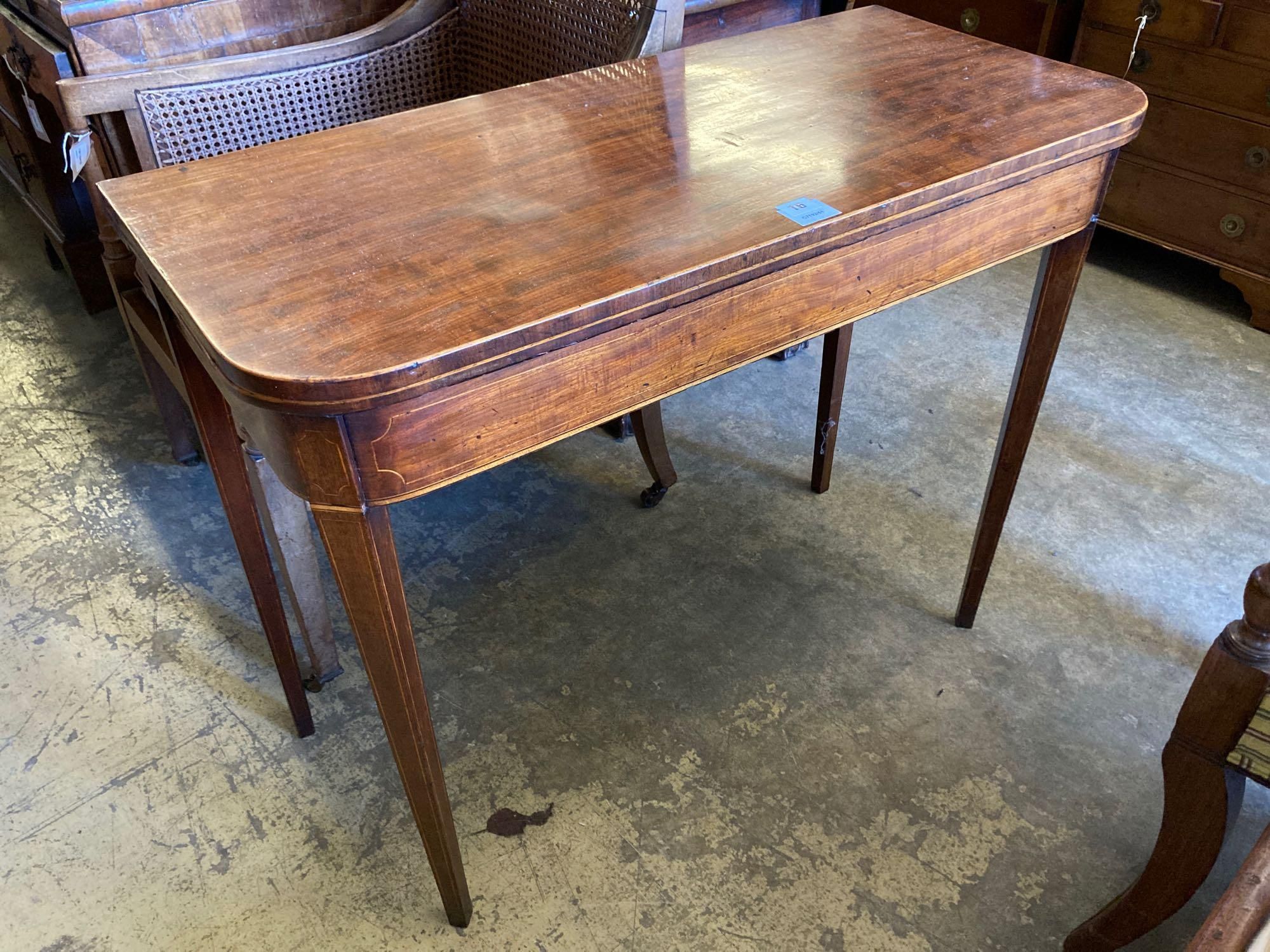 A late George III inlaid mahogany folding card table, width 91cm